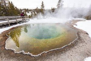 Morning Glory hot spring with snow