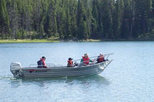 Family in motorboat out on the water