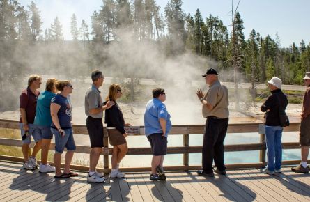 Group on a tour looking at hot springs