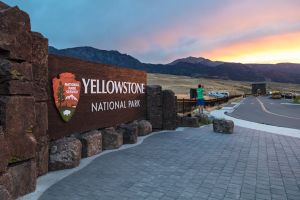 Sunset in Gardiner near the Park Entrance sign