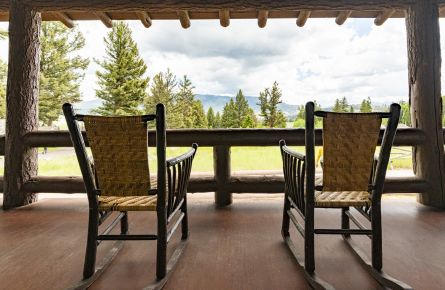 Two rocking chairs on the porch at Roosevelt Lodge